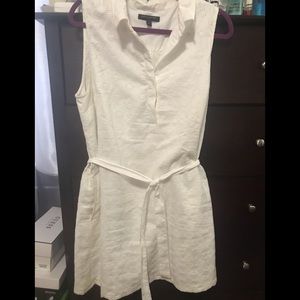 White eyelet summer dress with pockets.